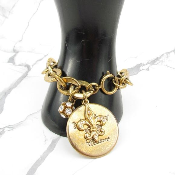 Juicy Couture Jewelry - Vintage Juicy Couture Round Medal & Charms  Bracelet